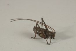 A BRONZE OKIMONO OF A LONGHORN BEETLE.