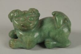A CHINESE CARVED GREEN HARDSTONE DOG OF FO, 8cm long.