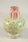 A CHINESE QIANLONG PERIOD GREEN GROUND PORCELAIN BENBAHU VASE, painted with auspicious symbols and