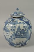 A CHINESE BLUE AND WHITE PORCELAIN GINGER JAR AND COVER, the base with six-character mark, 28cm
