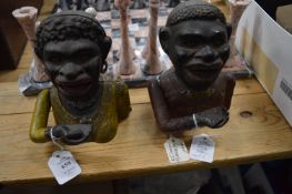 Two cast iron money boxes.