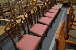 A set of six mahogany dining chairs.