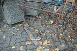 A cast and wrought iron table base.