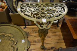 Brass and wrought iron trivet.