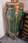 A large and impressive pair of faux malachite, marble and ormolu pedestals, 140cm high x 50cm wide.
