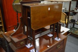 An Edwardian mahogany Sutherland table.