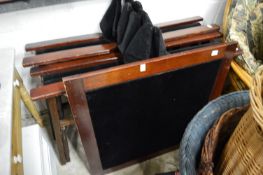 A set of four directors style folding chairs with a matching games table.