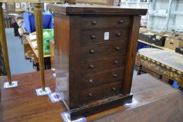A Victorian mahogany miniature Wellington chest.