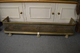 A pierced brass fender.