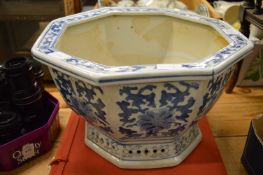 A blue and white octagonal shaped jardiniere together with a box set of reproductions of Hiroshige