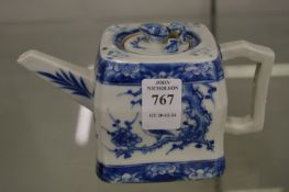 A small Chinese blue and white teapot.