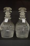 A good pair of Georgian decanters and stoppers engraved with fruiting vines.