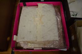 A small collection of lace and other textiles.