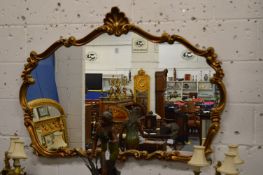 Decorative gilt framed mirror.