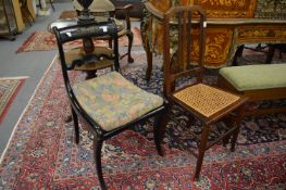 A Regency ebonised chair and another chair.