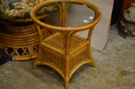 Glass top bamboo coffee table.