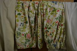 A pair of floral curtains, lined, approx size 100cm wide x 100cm long together with spare material