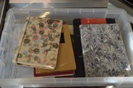 A collection of artists sketch books.