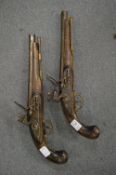 A pair of replica flintlock pistols.