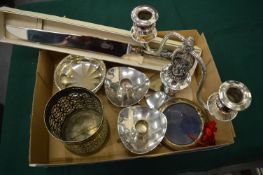 A plated candelabra and other items.