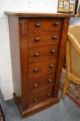 A Victorian walnut Wellington chest.