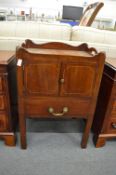 A George III mahogany commode.