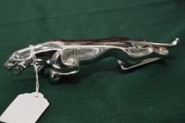 A chrome plated Jaguar car mascot.