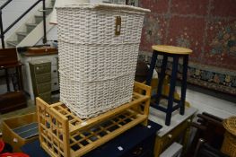 Wicker laundry basket and other items.