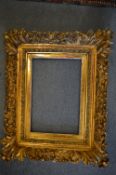 A 19th century gilt composition frame, rebate size 48cm x 32cm together with another frame, rebate