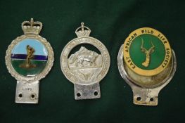 A chrome plated Royal East African automobile association bumper badge and two others.