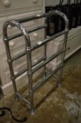 A good Victorian style chrome plated towel rail style radiator.