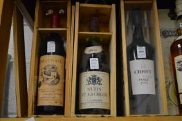 A bottle of Croft vintage port 2003, one bottle Nuits St. Georges 1969 and a bottle Greatwall red