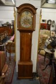 An 18th century oak longcase clock with eight day movement and father time automaton, the arched
