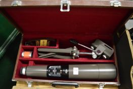 A Swift model 844 spotting scope with original box and accessories.