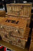 Four Fortnum and Mason wicker baskets.