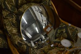 A pair of convex mirrors with wall brackets.