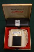 A Remington Lektronic II razor with original box.