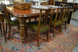 A Victorian style mahogany extending dining table with two leaves, extended size 240cm long x