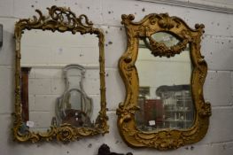 Two decorative gilt framed mirrors.
