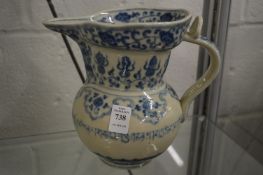 A Chinese blue and white Islamic style ewer.