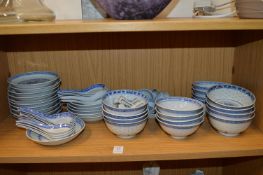 A quantity of Chinese blue and white rice pattern china.