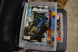 Three boxes of comics.