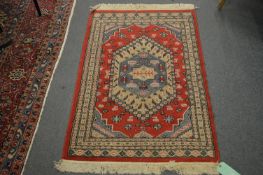 A small Persian style rug.