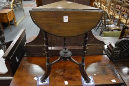 A Victorian mahogany clover leaf occasional table.