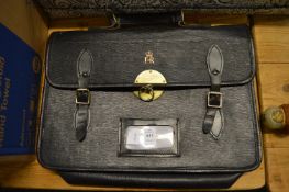 A leather attache case with Royal cypher.
