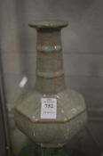 A Chinese celadon crackle glazed bottle vase.