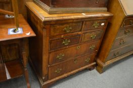 An 18th century walnut and oak chest of drawers.