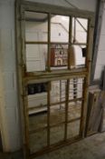 A large unusual distressed painted finish pine mirror 192cm x 102cm.