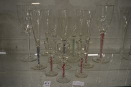 A good collection of modern glassware with colourful air twist stems.