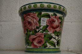 A Wemyss jardiniere decorated with cabbage roses.